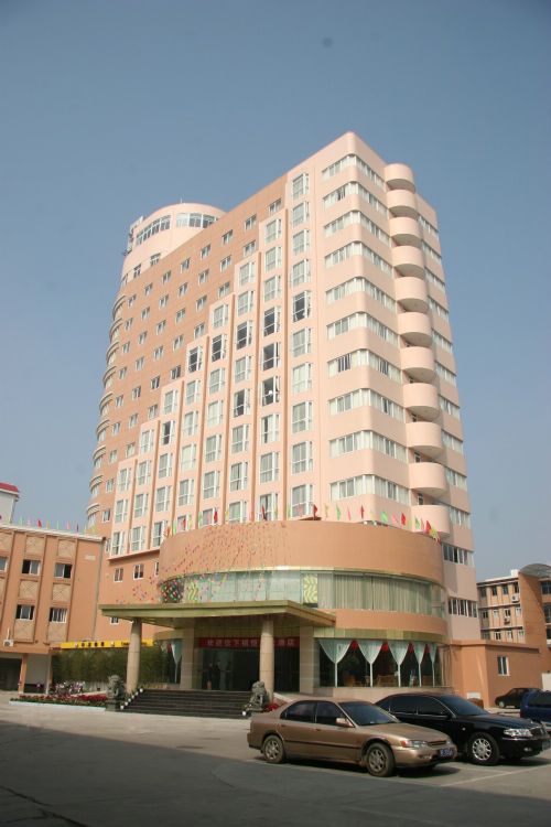 Hengbao Business Hotel Лунян Екстериор снимка